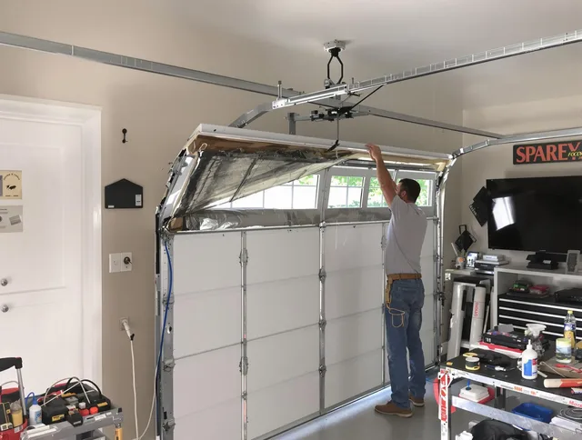 Garage door section replacement by Kingston Garage Door Repair in Kingston