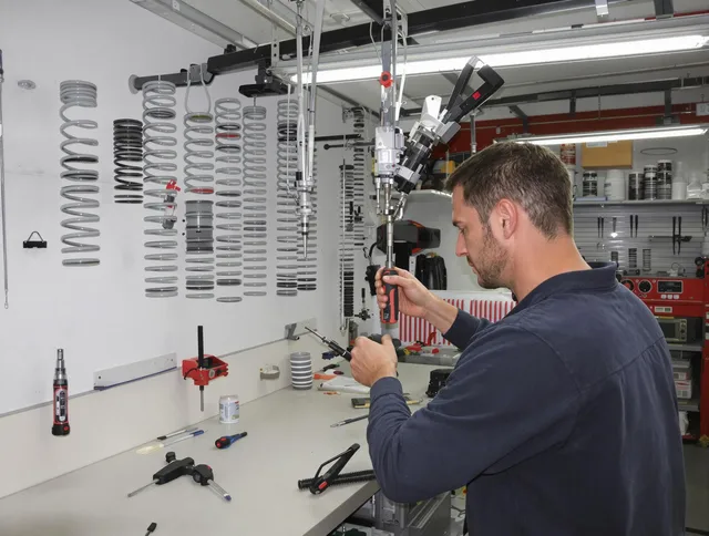 Kingston Garage Door Repair safety certified technician performing precision spring replacement in Kingston