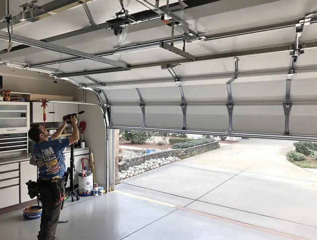Garage door track repair service by Kingston Garage Door Repair in Kingston